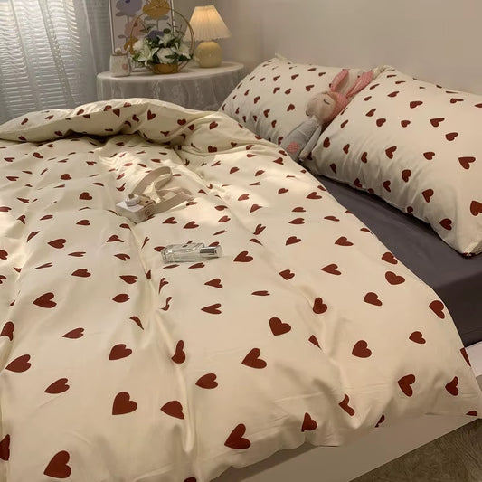 Housse de Couette Gros Coeur Rouge sur un lit