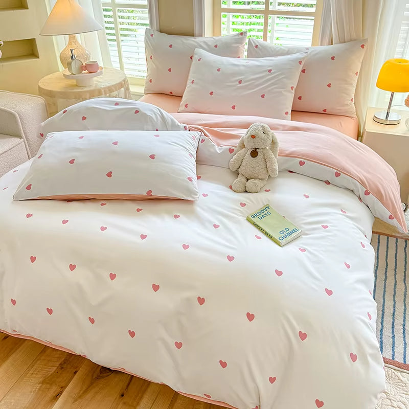 Housse de Couette Coeur Rose sur un lit